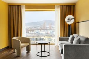 Family Room with Two Double and Sofa Bed - City View room in Renaissance Zurich Tower Hotel
