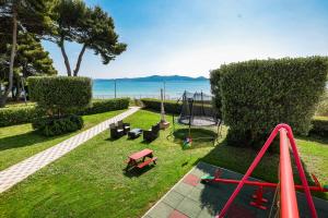 Apartments Becky on a sandy beach without crowd