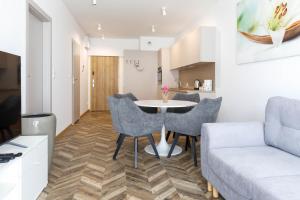 Grey Harmony Apartment by UniqueRent