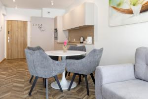Grey Harmony Apartment by UniqueRent