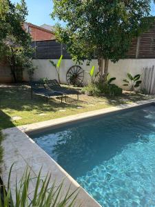 Villas Maison d-architecte avec piscine au centre-ville : photos des chambres