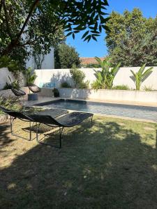 Villas Maison d-architecte avec piscine au centre-ville : photos des chambres