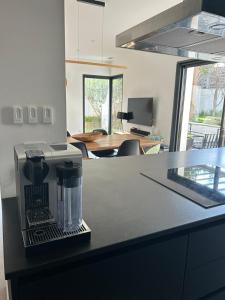 Villas Maison d-architecte avec piscine au centre-ville : photos des chambres