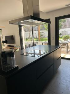 Villas Maison d-architecte avec piscine au centre-ville : photos des chambres