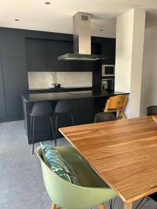 Villas Maison d-architecte avec piscine au centre-ville : photos des chambres