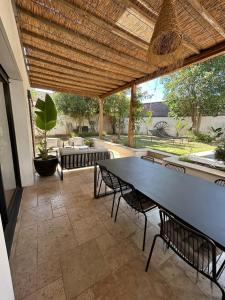 Villas Maison d-architecte avec piscine au centre-ville : photos des chambres