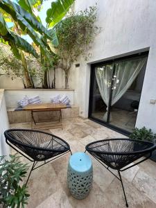 Villas Maison d-architecte avec piscine au centre-ville : photos des chambres
