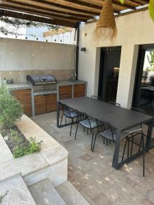 Villas Maison d-architecte avec piscine au centre-ville : photos des chambres