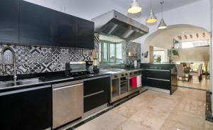 CASCADAS,stylish family villa poolside steps from beach