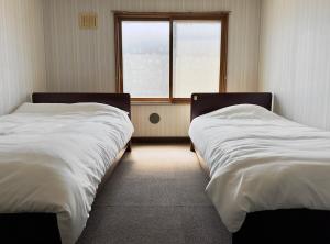 Private house Oheso 40minutes from Sapporo,4 free parking, long stay,16people