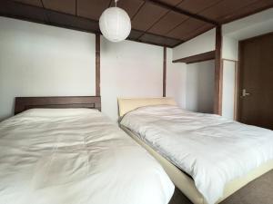 Private house Oheso 40minutes from Sapporo,4 free parking, long stay,16people
