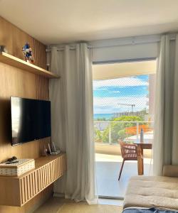 Apartamento NOvo na Praia do Morro Temporada Wi-Fi, Vista Mar, garagem, varanda grande