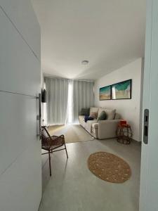 Apartamento NOvo na Praia do Morro Temporada Wi-Fi, Vista Mar, garagem, varanda grande