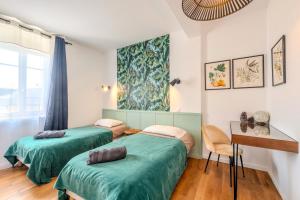 Maisons de vacances Maison 8 pers plein centre ville : photos des chambres