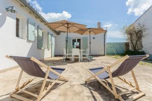 Maisons de vacances Maison familiale a 2 pas du port : photos des chambres