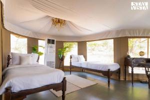StayVista at Masava - Luxury Tents with BBQ and Pool
