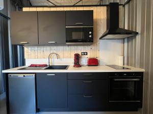 Appartements Le Garage : photos des chambres