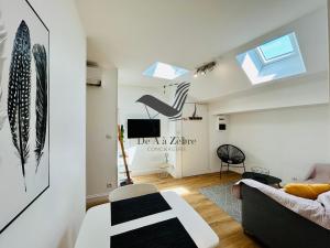 Appartements L'Authentique - Situe en face des thermes et tout proche du coeur de ville : photos des chambres