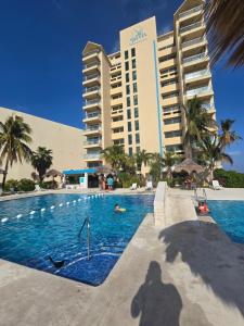 Espectacular Beach & Laguna view Cancun at SALVIA CONDOMINIUMS