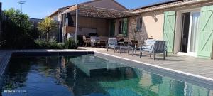 Maisons de vacances Entre deux - Villa avec piscine : photos des chambres