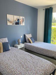 Maisons de vacances Maison avec piscine et jardin : photos des chambres