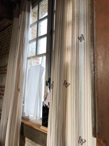 B&B / Chambres d'hotes Les Aires en Scenes au bord de l'eau : photos des chambres