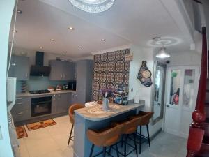 4 bed masonette with Garden