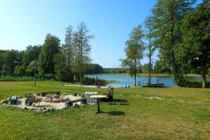 Domek nad Jeziorem Okrągłe plaża, pomosty wędkarskie, kajaki, jacuzzi, sauna