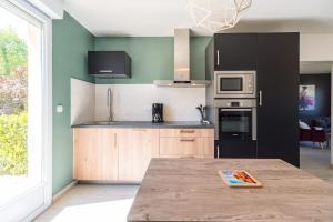 Maisons de vacances Maison pour 6 avec jardin proche de la mer : photos des chambres