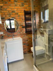 Domek Radawa, Koguty