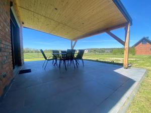 Domek Radawa, Koguty