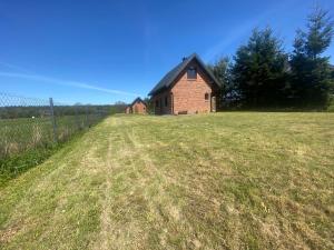 Domek Radawa, Koguty