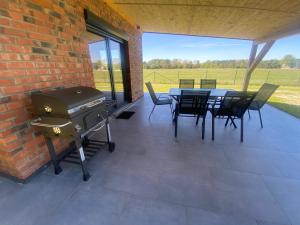 Domek Radawa, Koguty