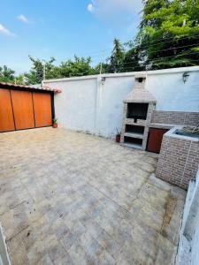 Exclusive family home with 4 bedrooms, a barbecue, and parking