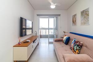 Apartamento Aconchegante e Elegante com Ar-Condicionado, Piscina, Garagem e Varanda Gourmet a 3 min da Praia