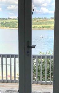 PERIWINKLE COTTAGE, with the most amazing sea view