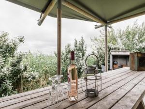 Tent house near dune by Belvilla