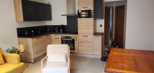 Appartement tout confort avec balcon et coin terrasse