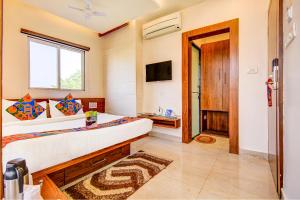 FabHotel Khushi Regent - Near DB Mall