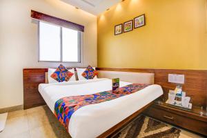 FabHotel Khushi Regent - Nr DB Mall