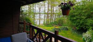 Domek rustykalny z sauną nad samym jeziorem z prywatną kładką