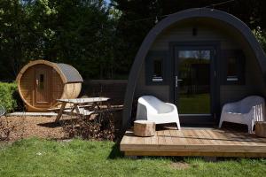 Knusse Glamping Pod met privé sauna & uitzicht