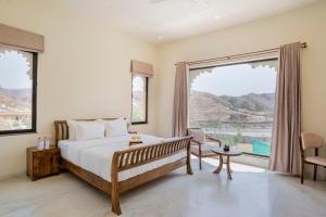 Luxury Villa in Udaipur with Pool & 360 Hill View By Ozy Stays