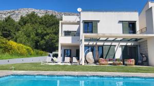 Holiday house in Split with sea view, terrace, air conditioning, WiFi 4937-1 - 4hvězdičkové hotely ve městě Solin