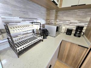 modern living two bedroom apartment with heated swimming pool well equipped gym ample parking space children playing ground and a relaxing rooftop with breathtaking scenic views