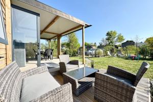 Maisons de vacances Charmant Bungalow Neuf Terrasse Jardin au calme : photos des chambres