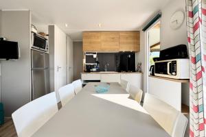 Maisons de vacances Charmant Bungalow Neuf Terrasse Jardin au calme : photos des chambres