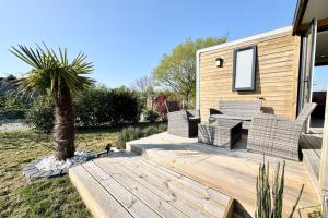 Maisons de vacances Charmant Bungalow Neuf Terrasse Jardin au calme : photos des chambres