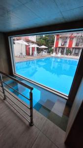 AP05 muito bem localizado atrás da arena axe Moi