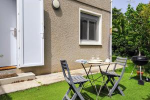 Villas Studio Occitanie 20 m2 tout equipe avec jardin : photos des chambres